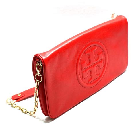 tory burch clutch shoulder bag.